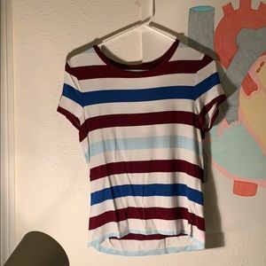 T shirt. Striped maroon, blue, and light blue.